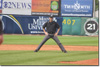 Chris Oberbroeckling working the Cedar Rapids Kernels in June 2013