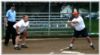 Rob Patchett works a Coralville Rec League SB game May 24, 2004.